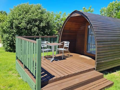 Camping Pod with deck area and outdoor seating